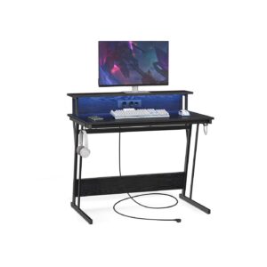 VASAGLE skrivbord med eluttag 100 x 60 x 76 cm svart med trämönster